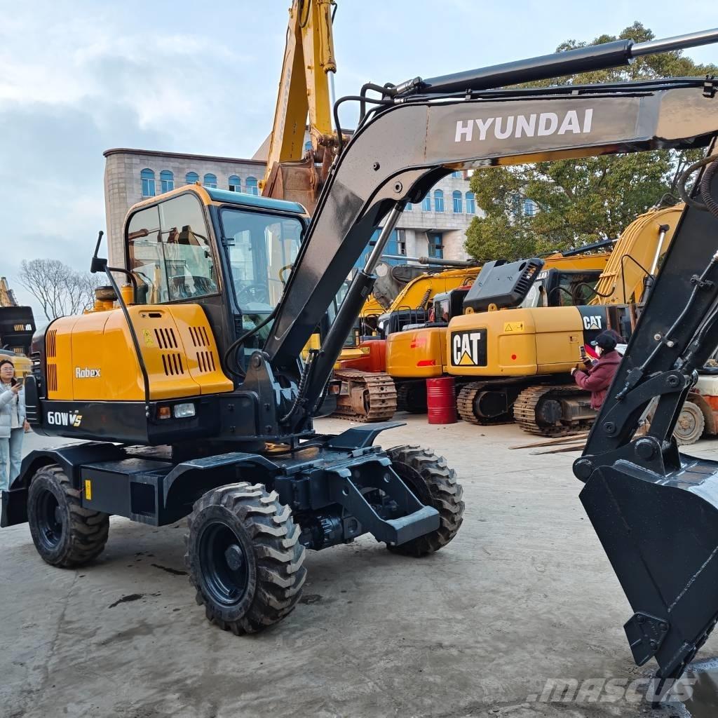 Hyundai 60 W VS Escavatori gommati
