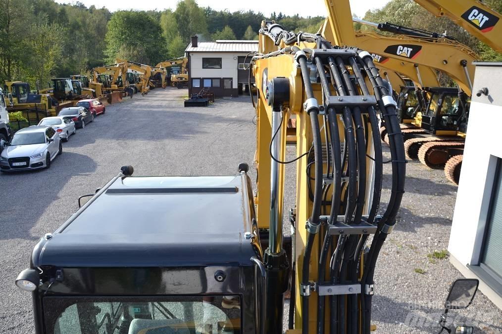 CAT M 315 D Escavatori gommati