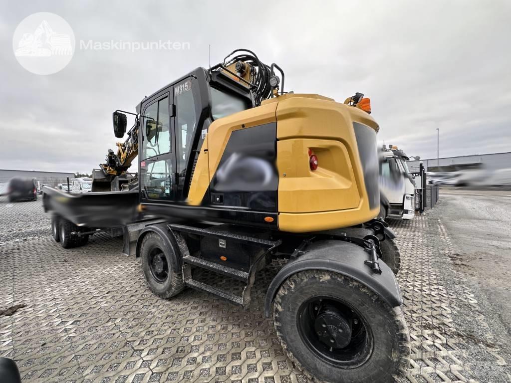 CAT M 315 Escavatori gommati