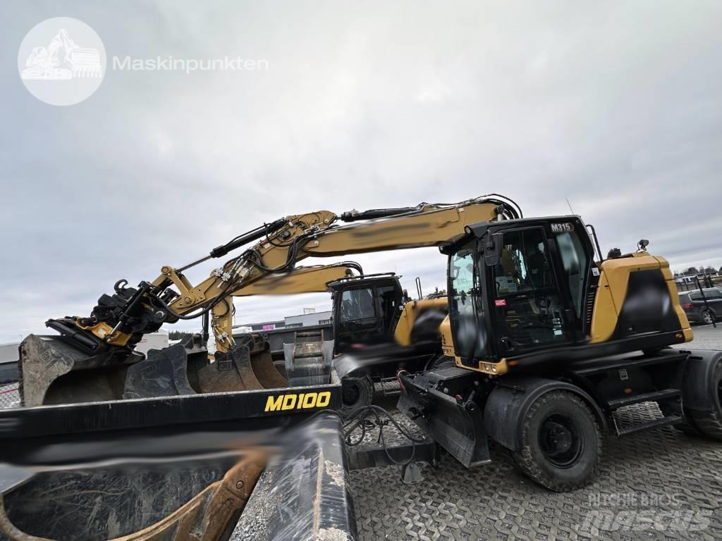 CAT M 315 Escavatori gommati