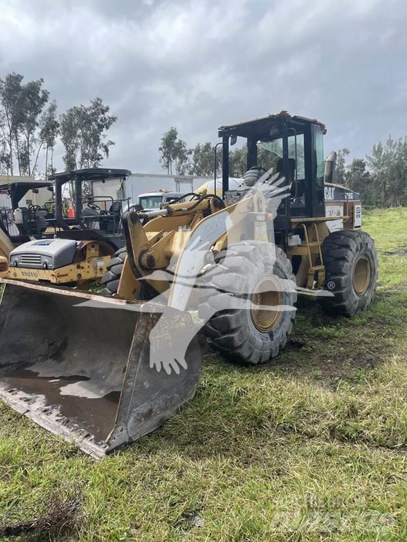 CAT 928G Pale gommate