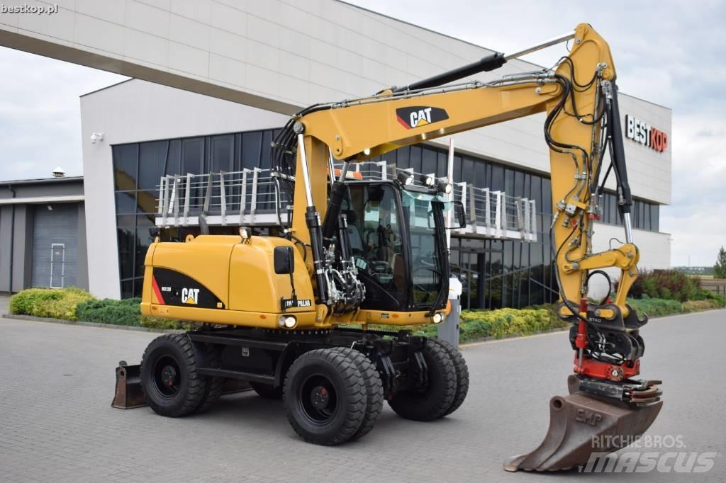 CAT M 313 D Escavatori gommati