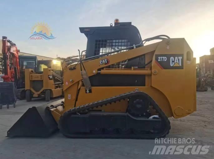 CAT 277D Mini Pale Gommate