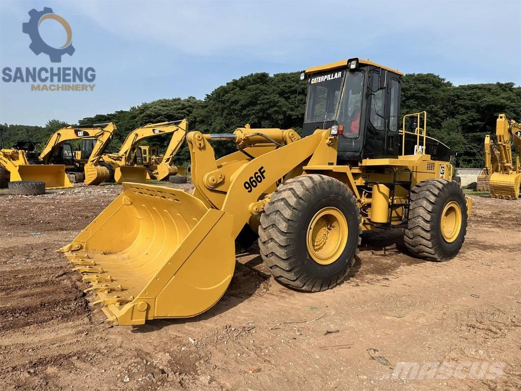 CAT 966F Pale gommate