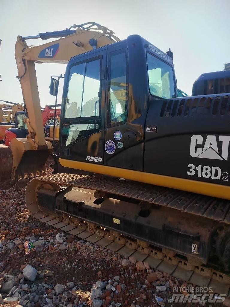 CAT 318 Escavatori cingolati