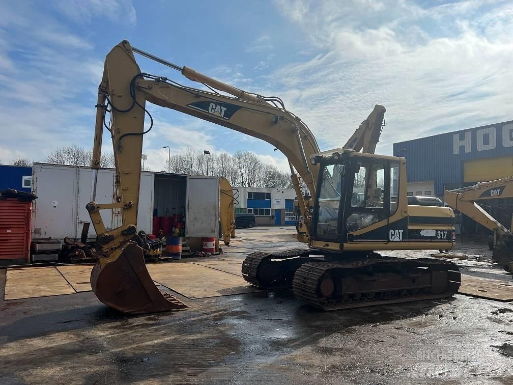 CAT 317 Escavatori cingolati