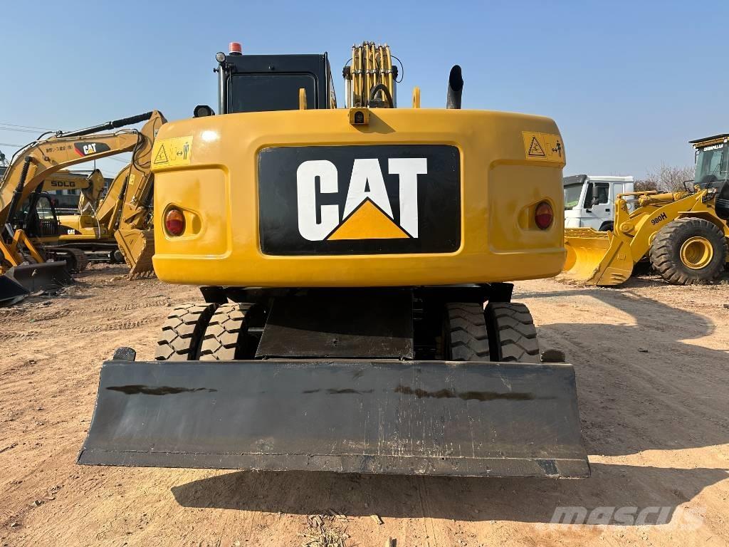 CAT M 320D Escavatori gommati