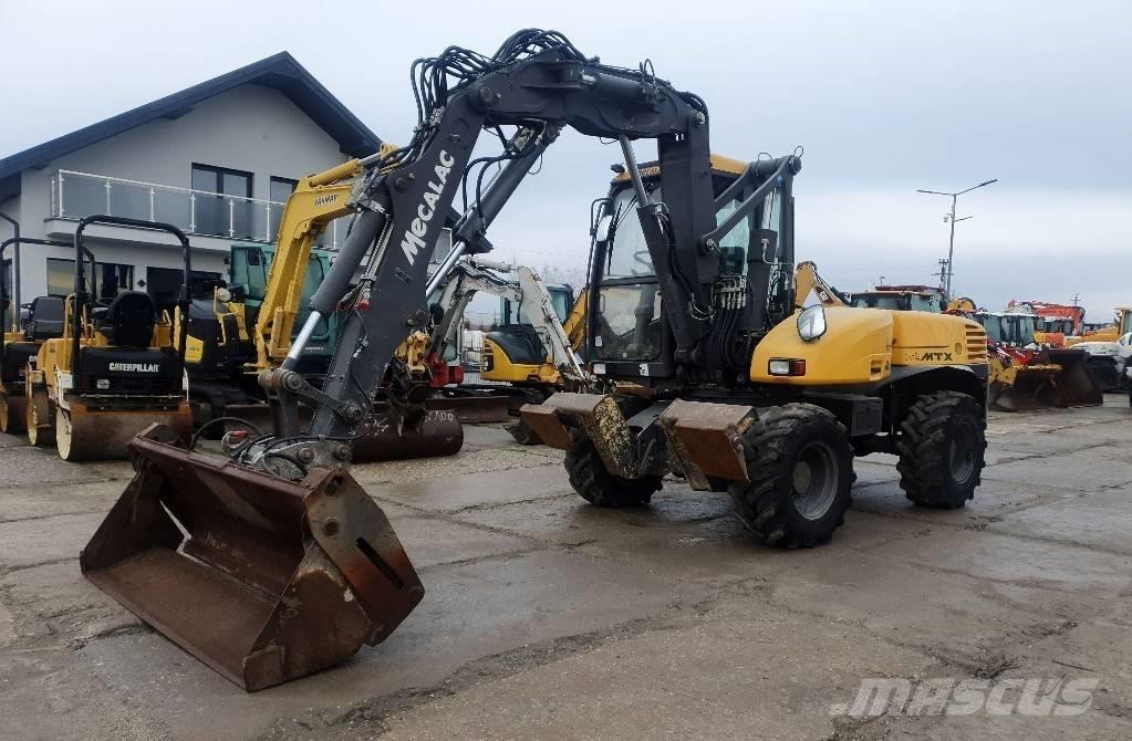 Mecalac 12 M TX Escavatori gommati