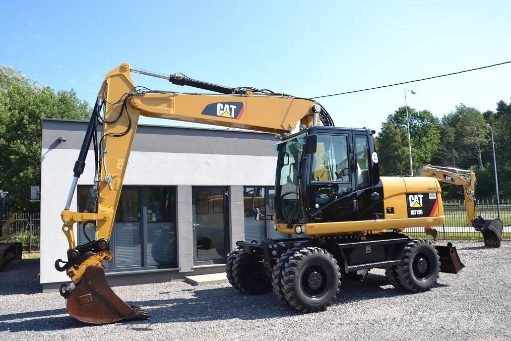 CAT M 315 D Escavatori gommati