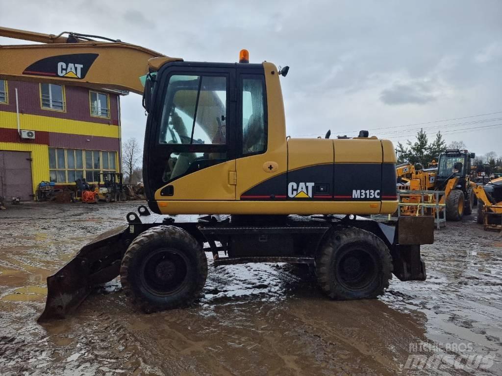 CAT M 313 C Escavatori gommati