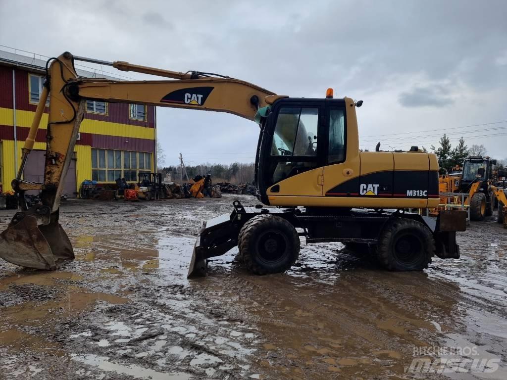 CAT M 313 C Escavatori gommati