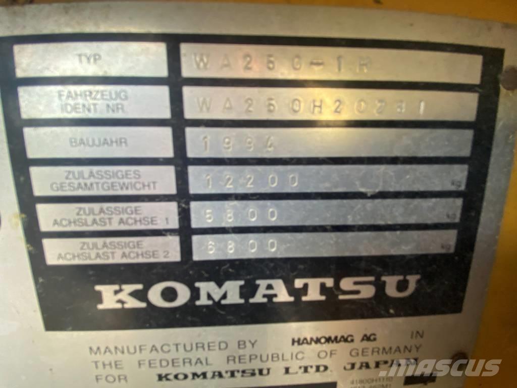 Komatsu WA 250 PT-1H Pale frontali e scavatori