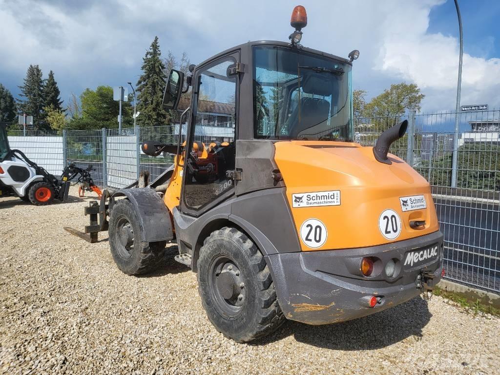 Mecalac AX 700 Pale gommate
