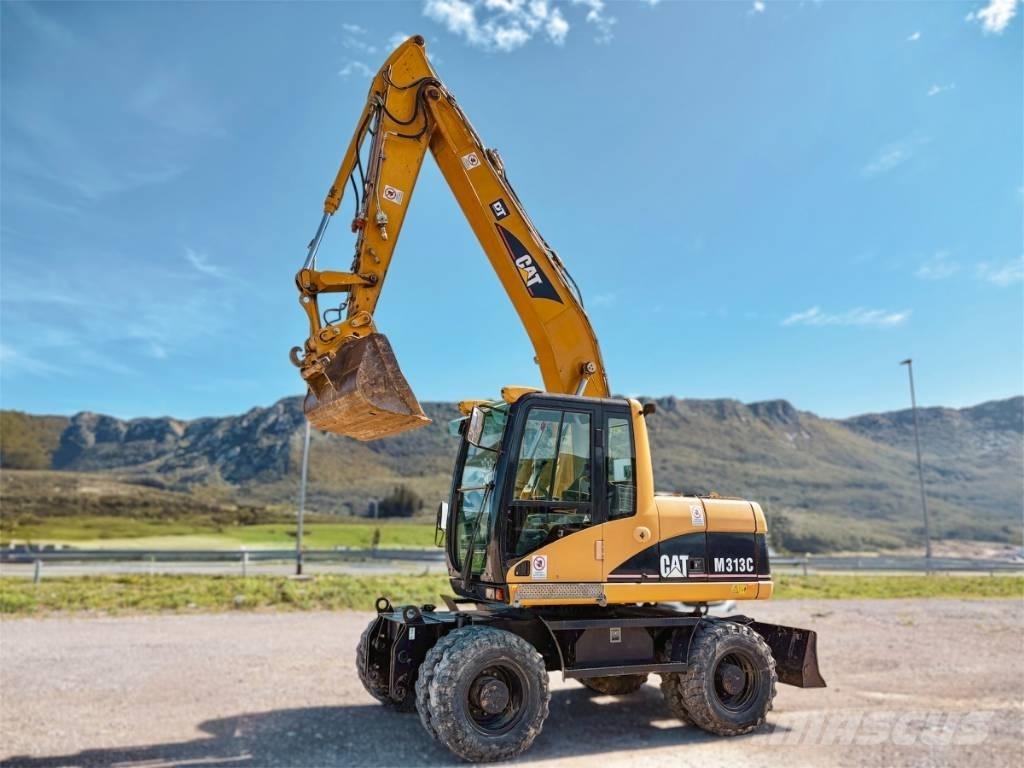 CAT M 313 C Escavatori gommati