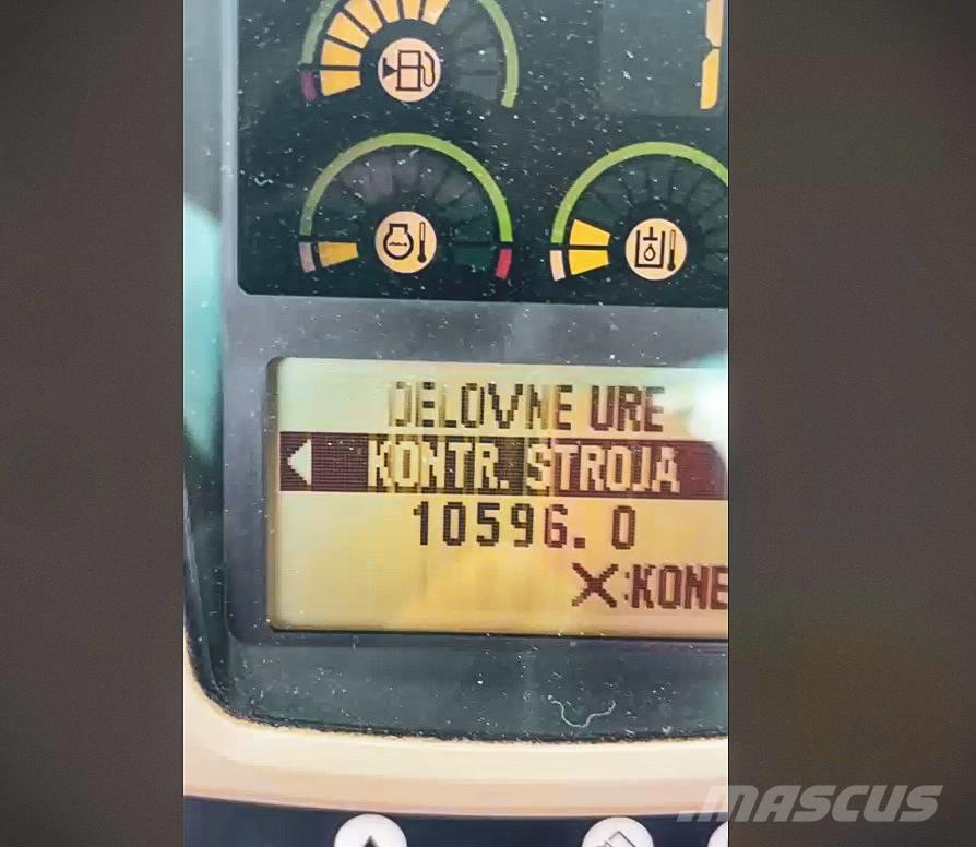 CAT M 313 C Escavatori gommati