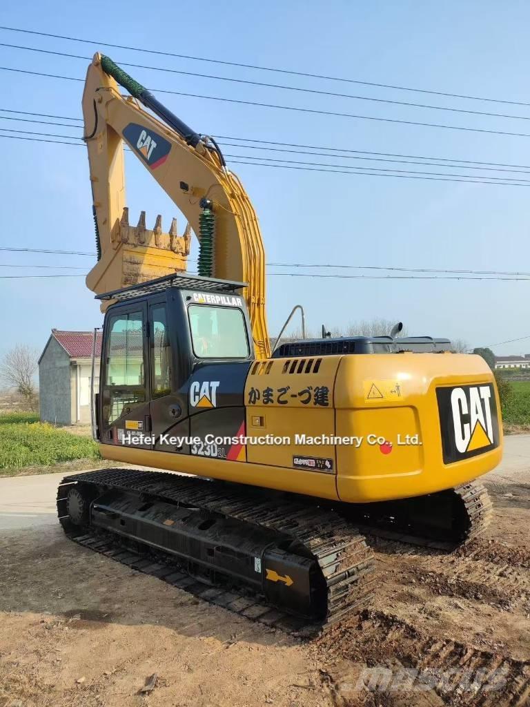 CAT 323 Escavatori cingolati
