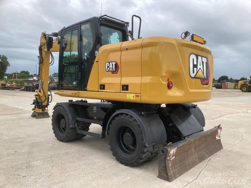CAT M314 Escavatori gommati