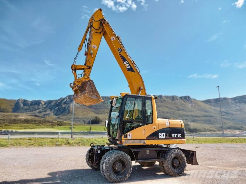 CAT M 313 C Escavatori gommati