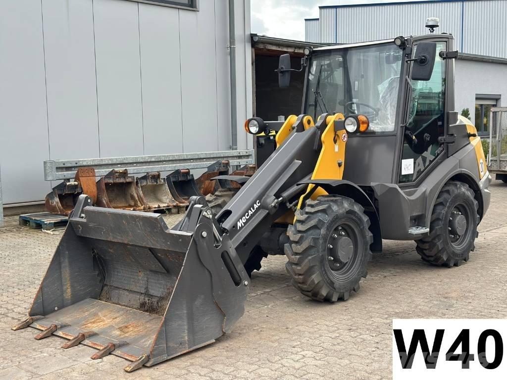 Mecalac AX 700 Pale gommate