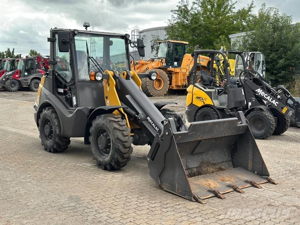 Mecalac AX 700 Pale gommate