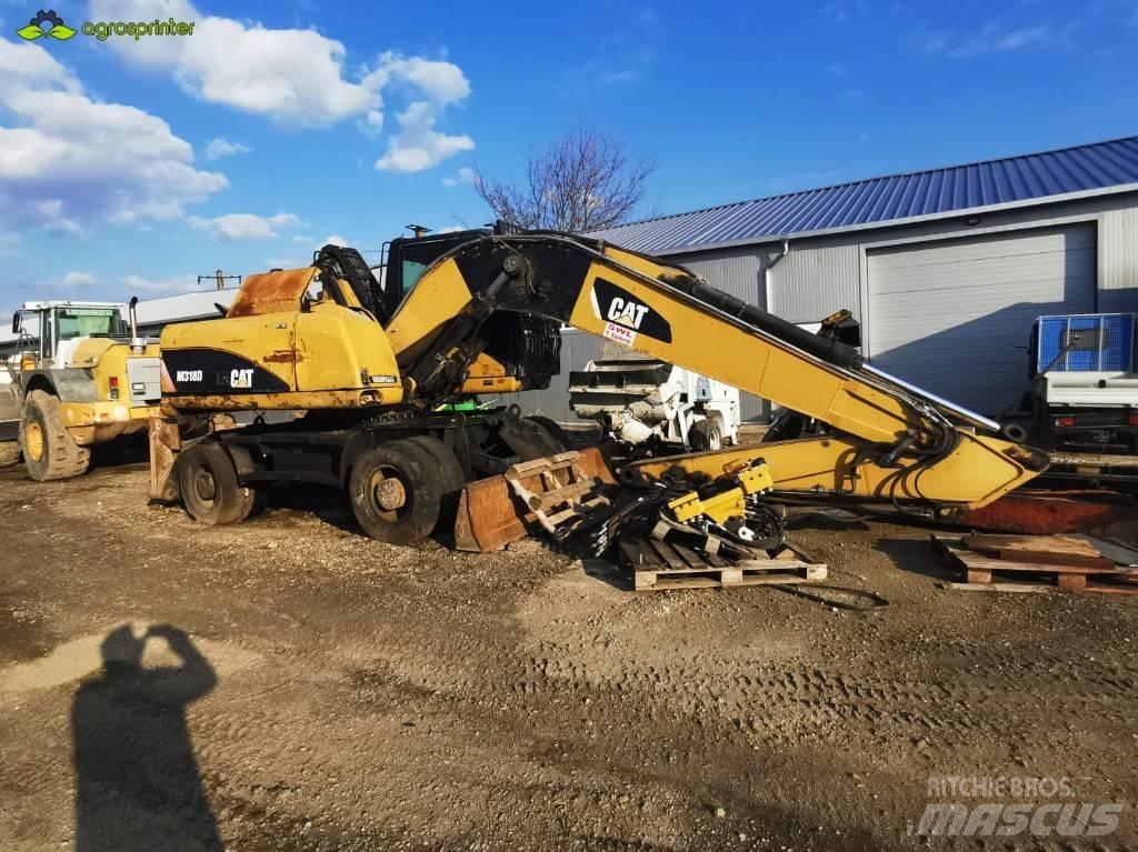 CAT M 318 D Movimentazione rifiuti