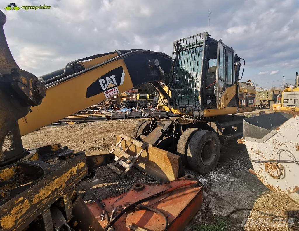 CAT M 318 D Movimentazione rifiuti