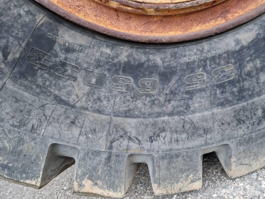 CAT 988 F Pale gommate