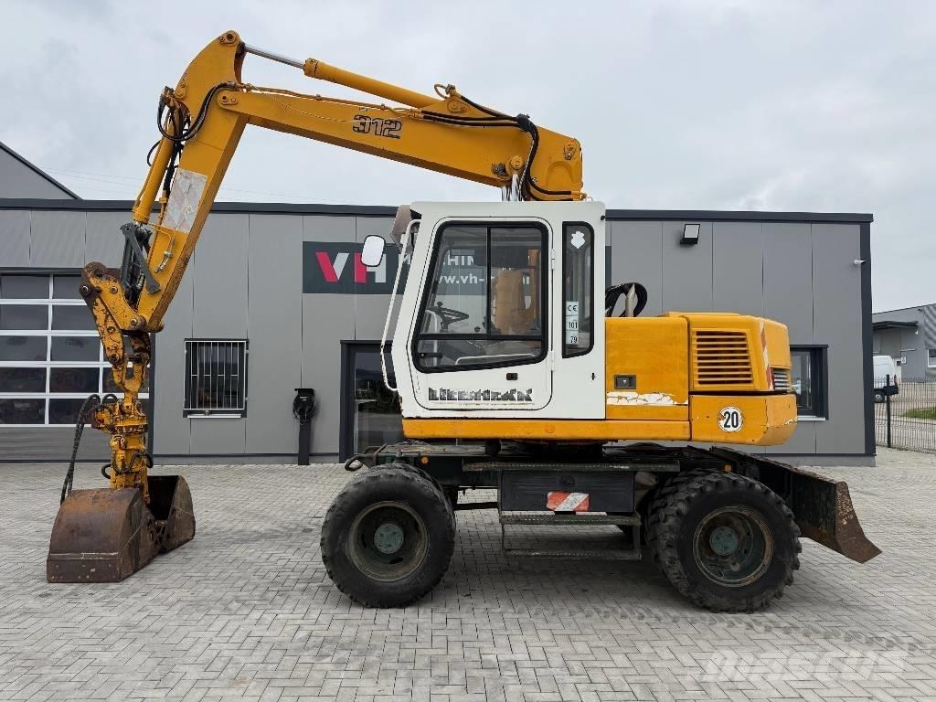 Liebherr A 312 Escavatori gommati
