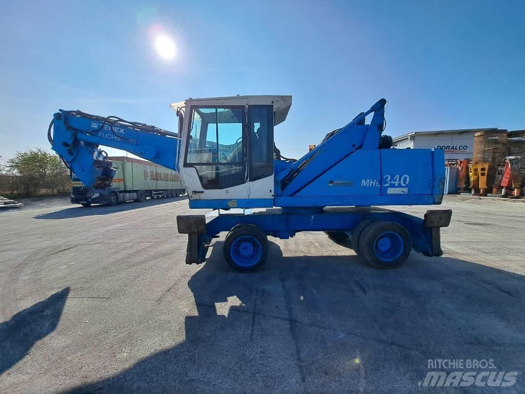 Fuchs MHL  340C FQC Movimentazione rifiuti