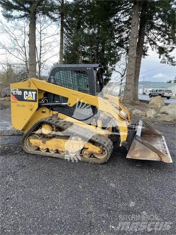 CAT 279D Mini Pale Gommate