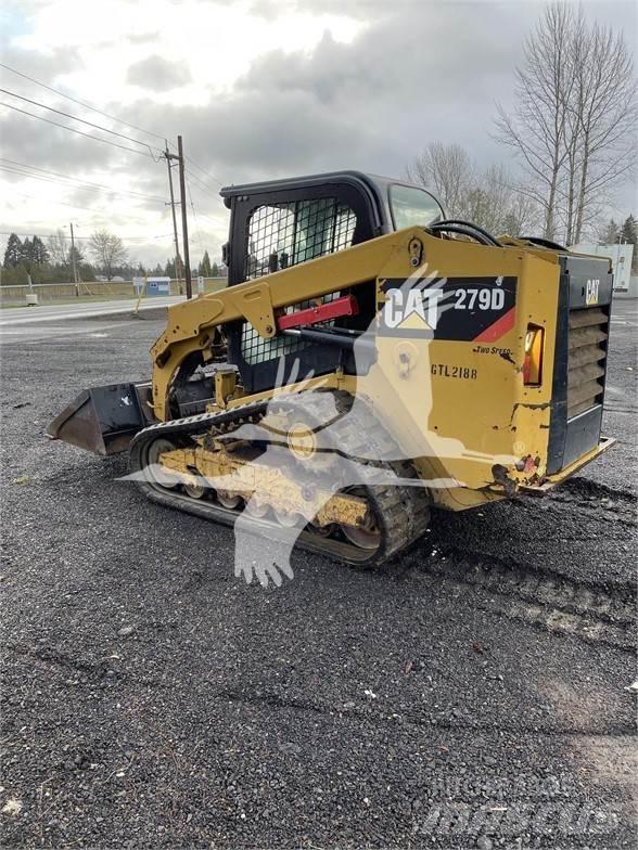 CAT 279D Mini Pale Gommate