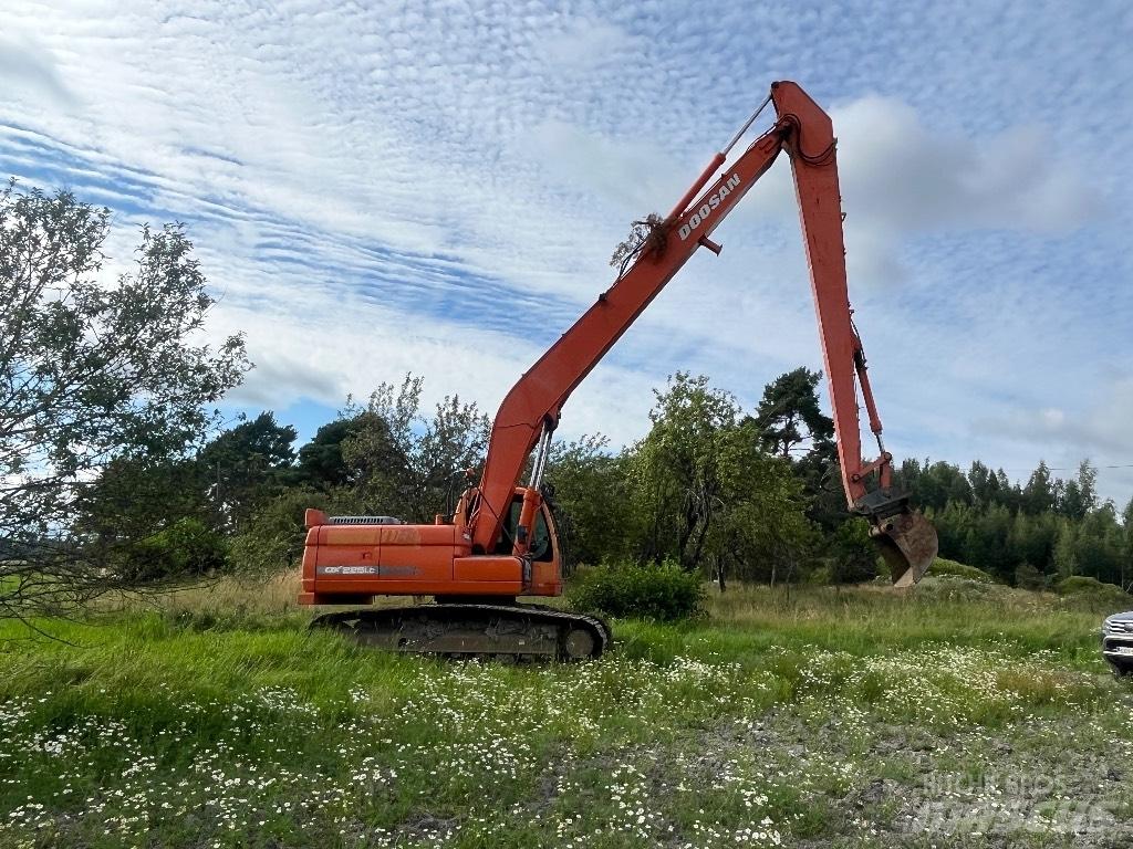 Doosan DX 225 LC Escavatori a lunga portata