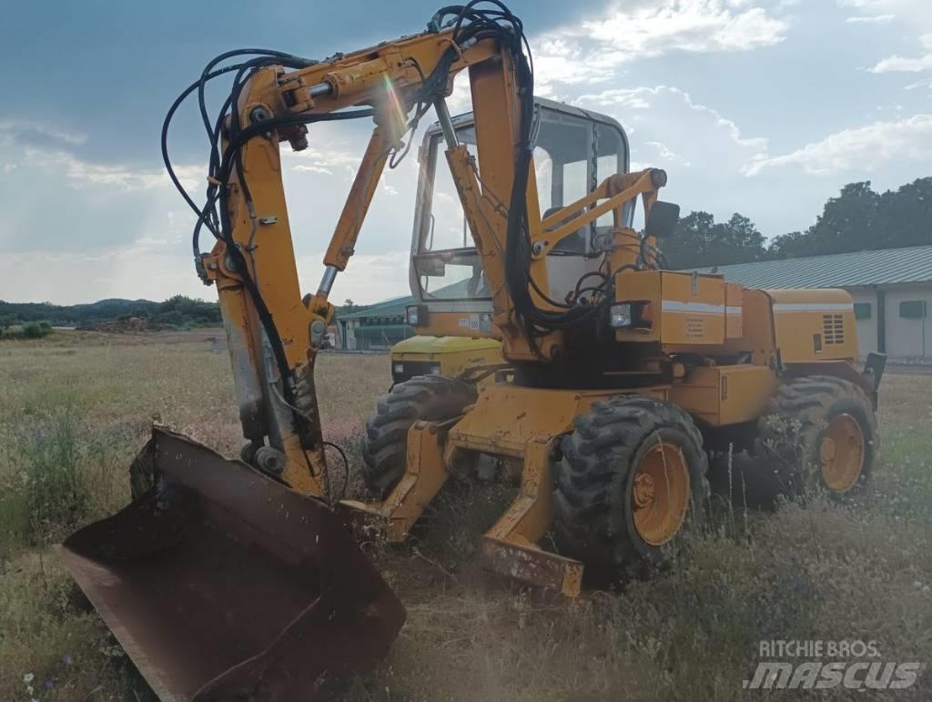 Mecalac 11 CX Escavatori gommati