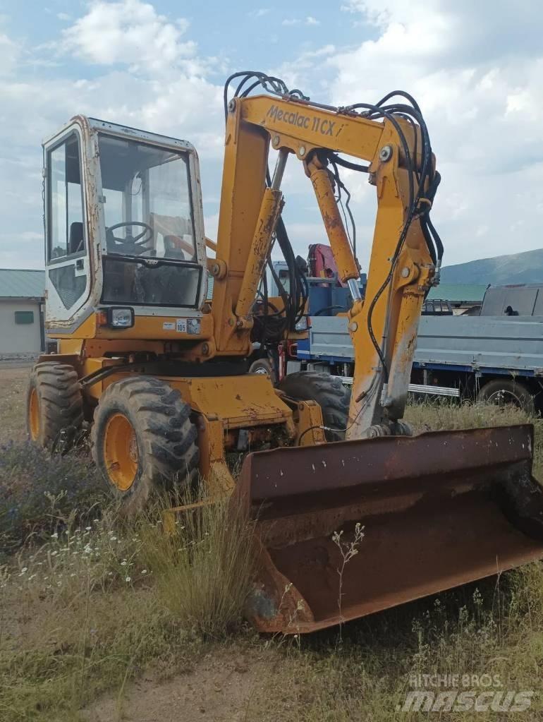 Mecalac 11 CX Escavatori gommati