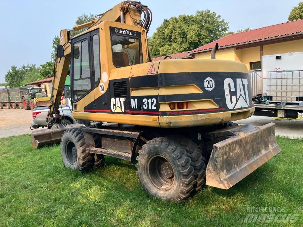 CAT M 312 Escavatori gommati