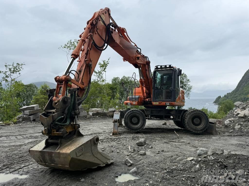 Doosan 140 W Escavatori gommati