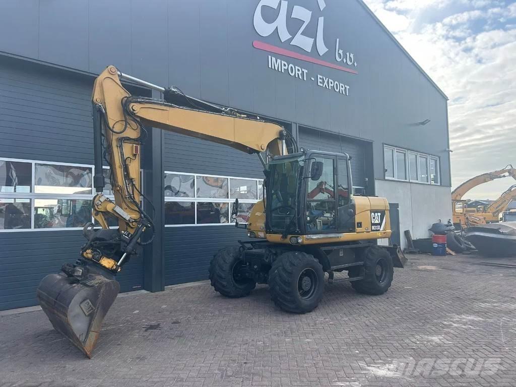 CAT M313D Escavatori gommati