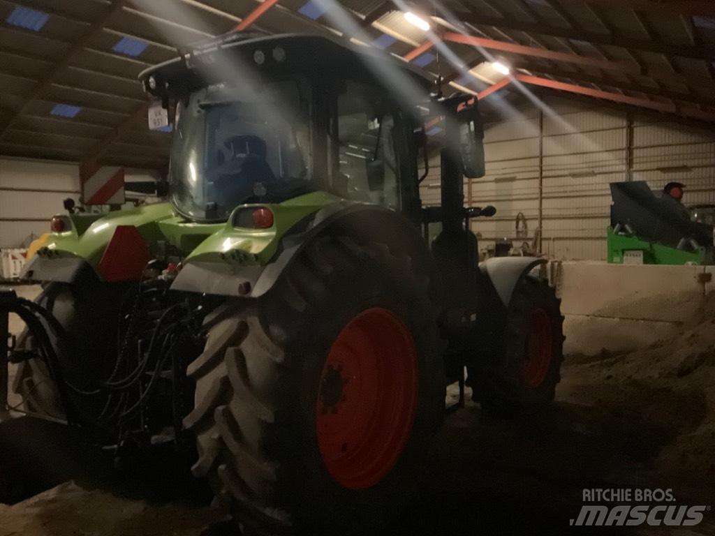 CLAAS ARION 650 cis + Trattori