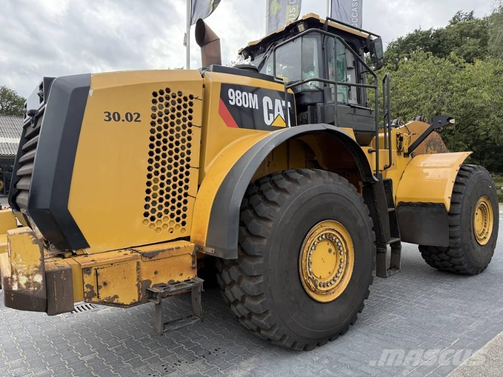 CAT 980M shovel + Bak Pale gommate