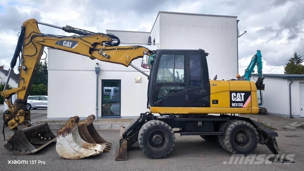 CAT M 313 D Escavatori gommati
