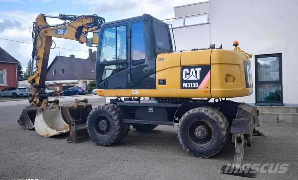 CAT M 313 D Escavatori gommati