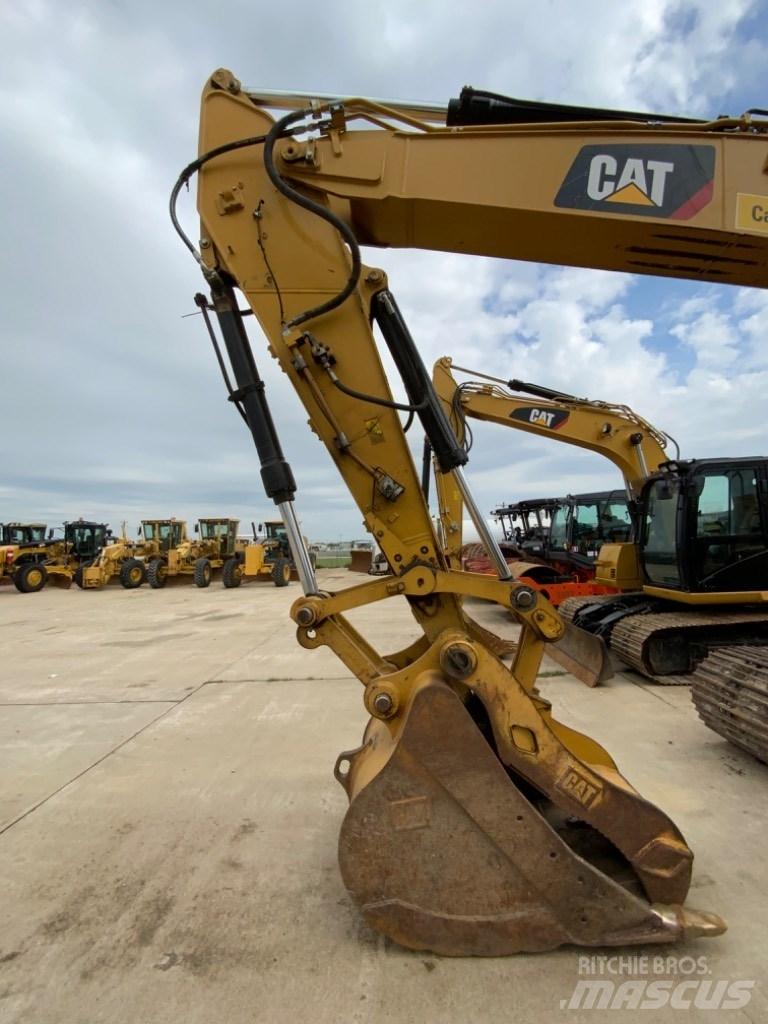 CAT 323 Escavatori cingolati