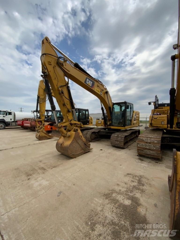 CAT 323 Escavatori cingolati