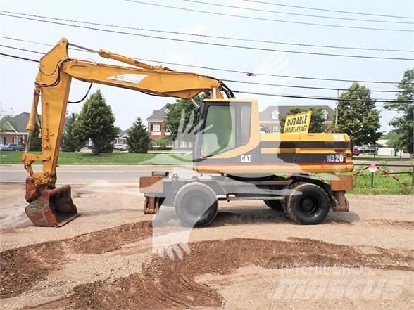 CAT M320 Escavatori gommati
