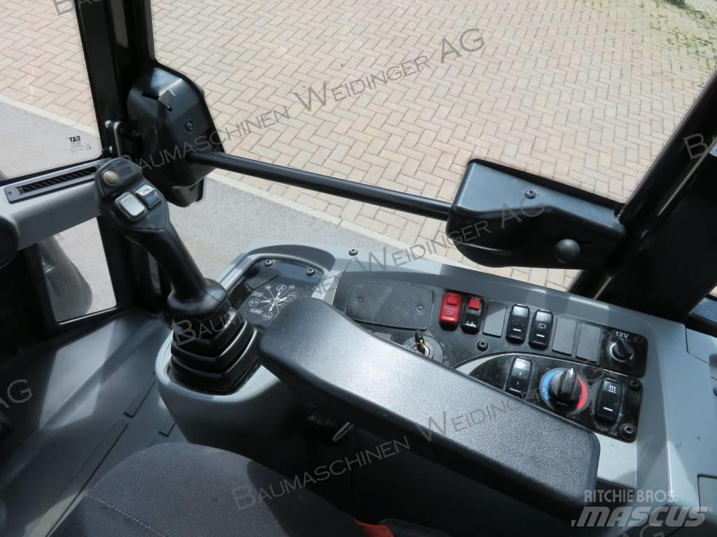 CAT 906M Pale gommate