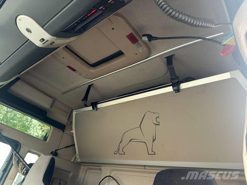 MAN TGX 33.500 Camion per il trasporto di macchine forestali