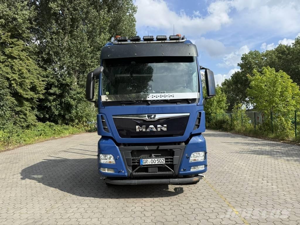 MAN TGX 33.500 Camion per il trasporto di macchine forestali