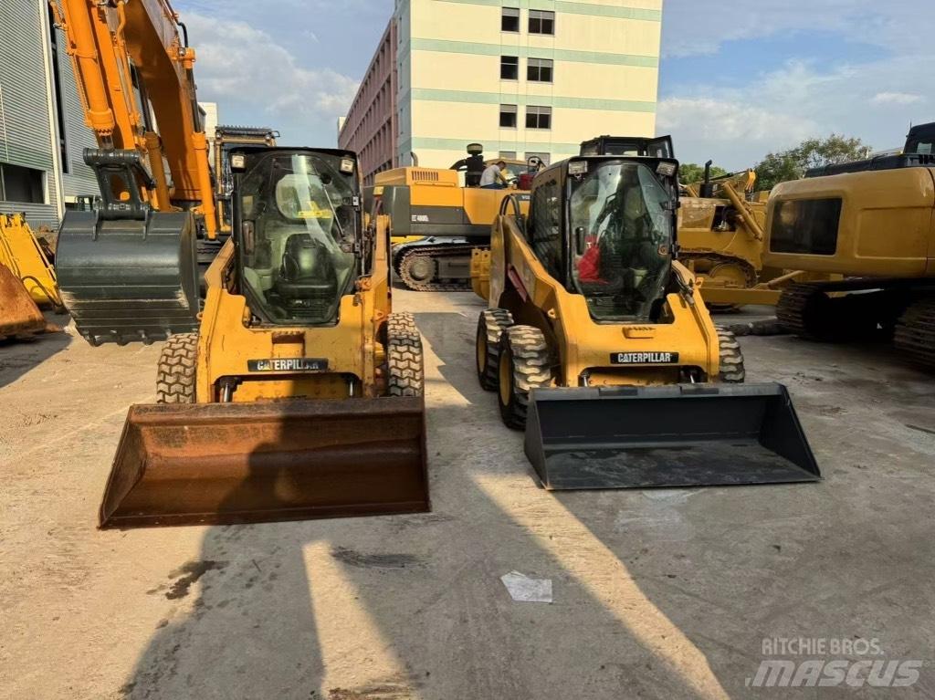 CAT 246 C Mini Pale Gommate