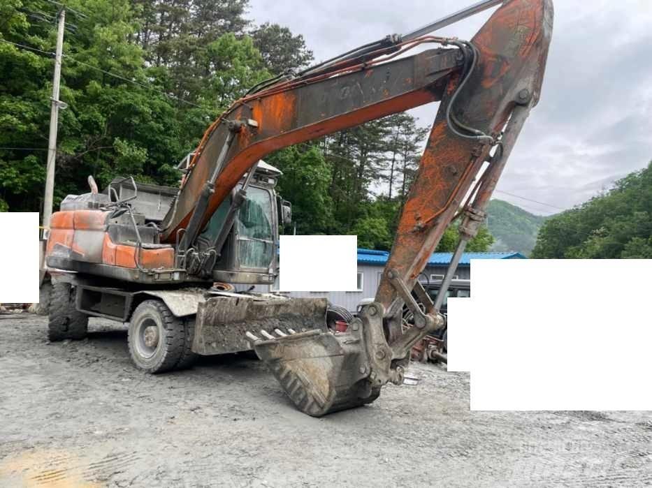 Doosan DX 210 W Escavatori gommati