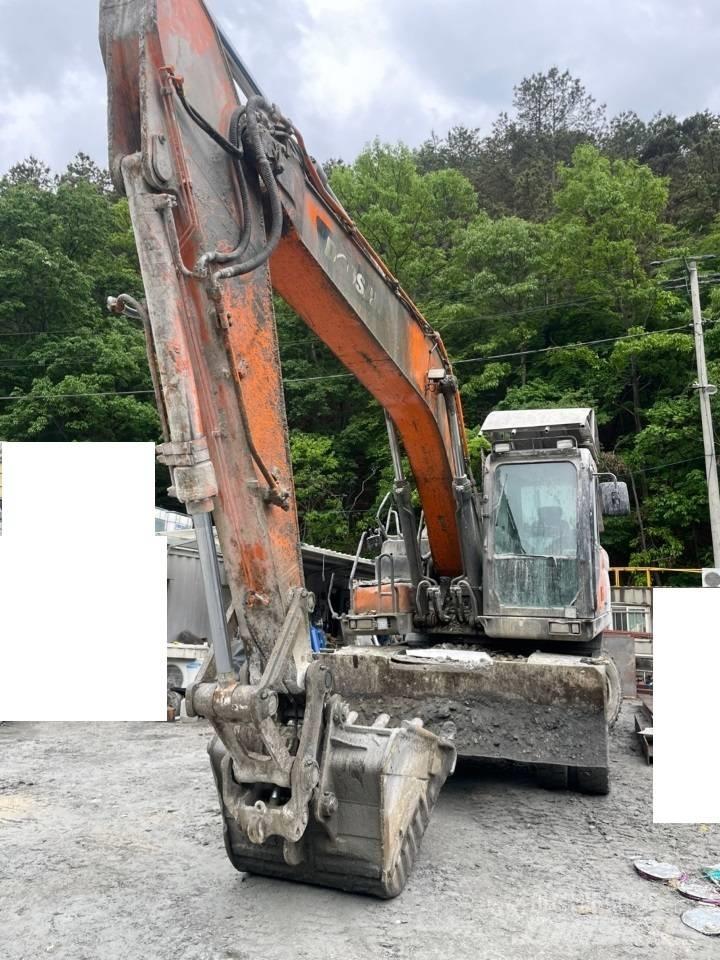 Doosan DX 210 W Escavatori gommati